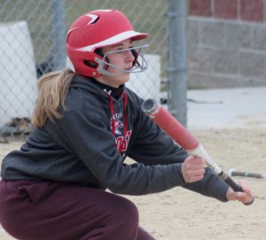 Jordan Rucks is ready to lay down a bunt while working out with the Weyauwega-Fremont softball team.  Greg Seubert Photo