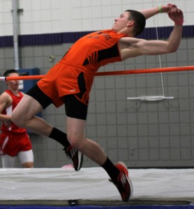 Jalen Block arches his back to clear the 5 foot, 4 inch mark in the boys' high jump event March 31 at an indoor track meet at the University of Wisconsin-Stevens Point. He placed third with a top height of 5 feet, 6 inches. Holly Neumann Photo