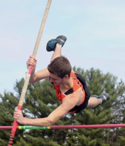 Clintonville's Anthony Pues competes in the boys' pole vault event at the Waupaca County Meet. He placed fourth with a top height of 8 feet, 6 inches. Greg Seubert Photo
