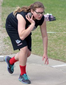 New London's Makenzie Monty placed second in the girls' shot put event behind Marion's Kalyssa Watters. Greg Seubert Photo