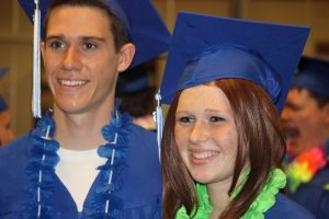 Taylor Vaughn poses for a photo with senior Jordan Kallevig before Waupaca High School's graduation ceremony May 29. Vaughn plans to attend the University of Wisconsin-Stevens Point, while Kallevig is heading to Mid-State Technical College.  Greg Seubert Photo