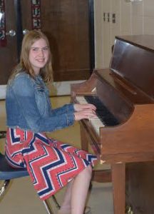 A piano solo was presented by Grace Peterson at the 4H talent contest.
