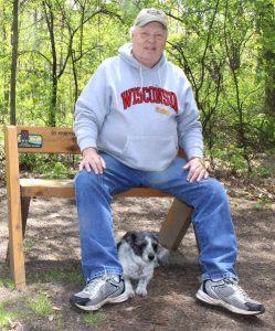 Dave Christensen and his wife, Rosie, have been campground hosts at Hartman Creek State Park for five years. The Christensens and their dog, Scruffy, greet campground visitors.  Greg Seubert Photo