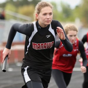 Manawa's Jody Wentworth makes her way around the track in the girls' 3,200-meter relay race May 14 at the Central Wisconsin-8 Conference meet in Weyauwega. Wentworth and teammates Carlene Beyer, Sami Struzynski and Anna Arndt placed fifth overall.  Holly Neumann Photo
