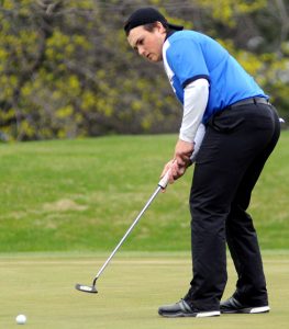 Waupaca's Elliot Crisman putts at Clintonville's Riverside Golf Course May 3 during a North Eastern Conference match.  Scott Bellile Photo