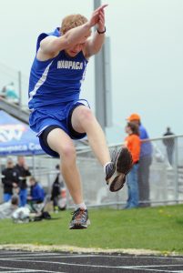 Jared Doro competes in the triple jump event for Waupaca in Clintonville. He placed ninth.  Scott Bellile Photo