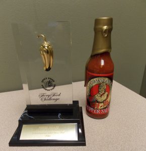 Uff Da Scandinavian Gold Hot Sauce won a trophy in the 2016 Fiery Food Challenge.  Jane Myhra Photo