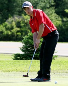 Manawa's Ryan Schuelke watches as his ball heads toward the hole on the eighth green during a Division 3 sectional golf meet at Glacier Wood Golf Club in Iola. Schuelke advanced to the WIAA state meet by shooting a round of 78.  Holly Neumann Photo