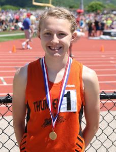Iola-Scandinavia's Erika Kisting returned home from the WIAA State Track & Field Championships with state titles in the girls' 1,600- and 3,200-meter runs.  Holly Neumann Photo