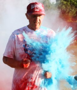 Paul Ziemann covers Joe Jones with blue powder during the Color Burst Run in Iola. Holly Neumann Photo