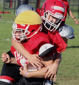 Cole Hudziak tackles running back Ean Marker during a recent practice at Weyauwega-Fremont High School. The Indians will open their season on the road at 7 p.m. Friday, Aug. 19, with a nonconference game against Adams-Friendship in Friendship. Greg Seubert Photo