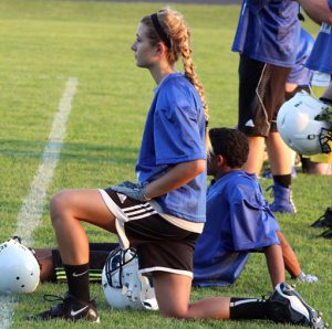 Alyssa Spierings watches practice from the sidelines. Greg Seubert Photo