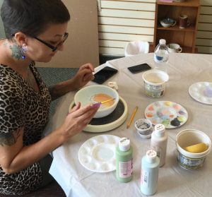 Sarah Vander Velden paints a bowl for the Oct. 1 Soup in Art Bowls event. Submitted Photo
