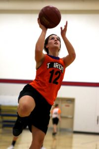 Kendall Johnson shoots a layup during the first day of practice at Iola-Scandinavia High School. Holly Neumann Photo