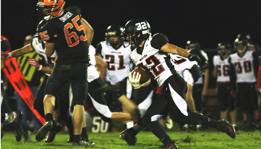 Hunter Westphal gets a 5 yard run for the Manawa Wolves.Holly Neumann Photo