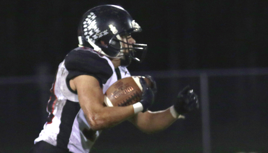 Jackson Jaeger carries the ball  for the Wolves.Holly Neumann Photo