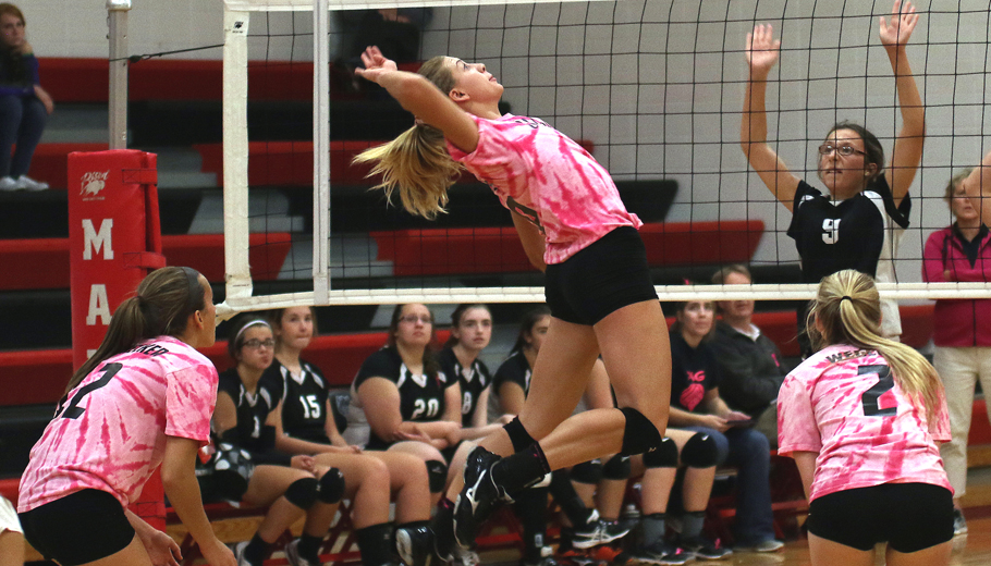 Laynie Bessette goes up to spike the ball for Manawa. Holly Neumann Photo