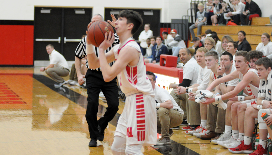 Connor Brinkman launches a 3-pointer from the corner. Erik Buchinger photo