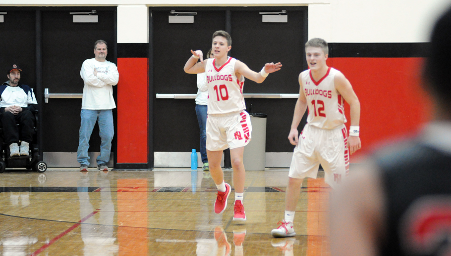 Nick Roberts celebrates after a 3-pointer late in the game.