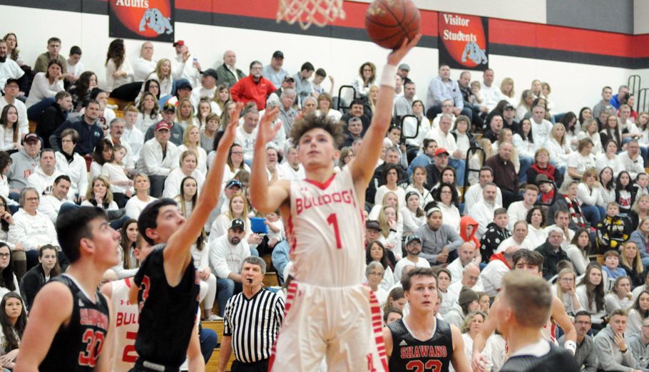 Brady Rodgers goes up for a shot with his left hand. Erik Buchinger photo