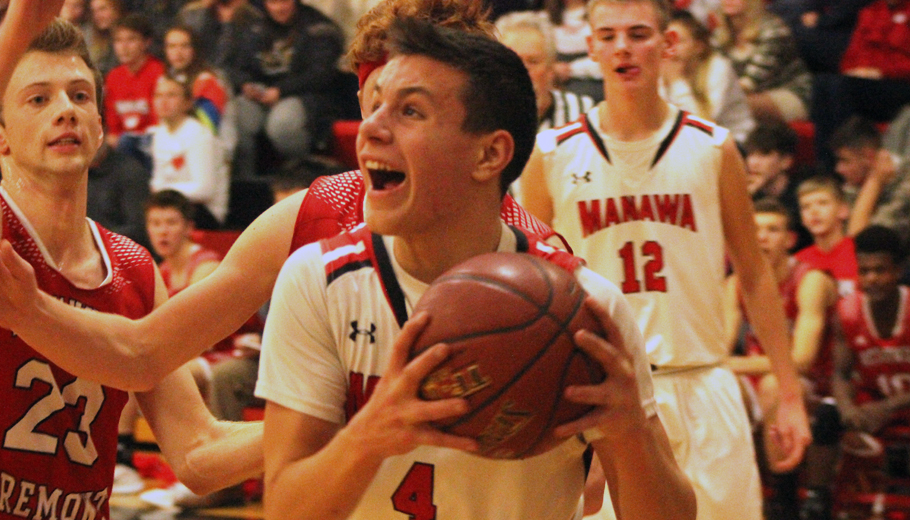 Riley Krenke drives to the basket for Manawa.
Greg Seubert Photo