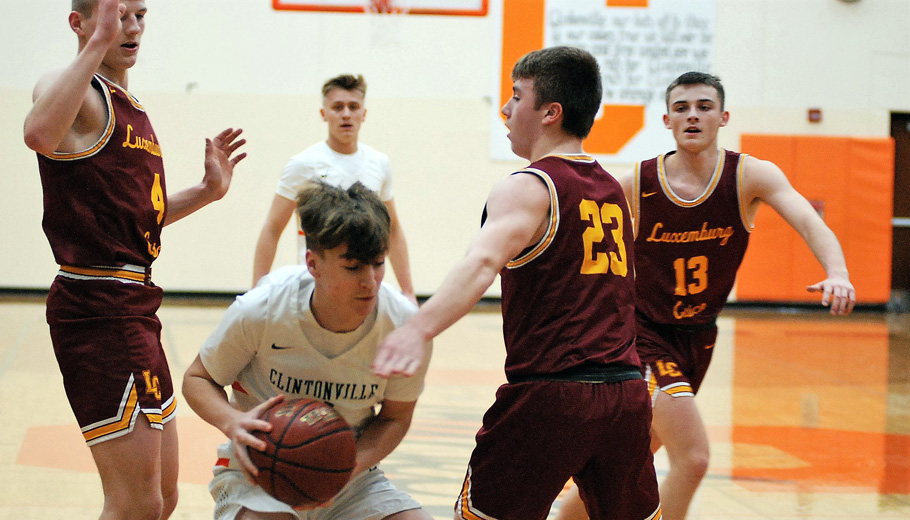 Clintonville's Cole Rosenow runs into traffic in the paint.
Jeff Hoffman Photo