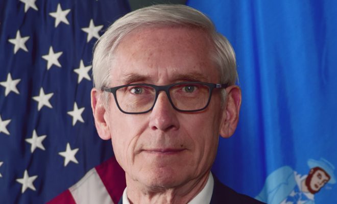 Evers suspends in-person voting