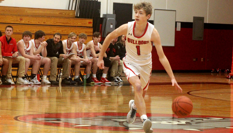 Keagan Reybrock brings the ball up the court for New London.Greg Seubert Photo