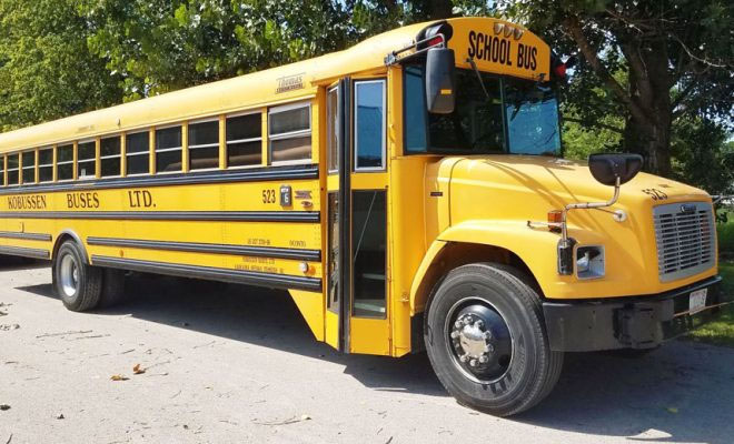 Van hits school bus